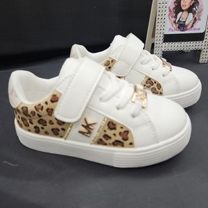 Kids size 7 custom Michael Kores shoes